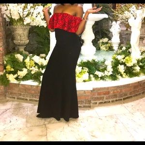 Black dress with red lace overlay